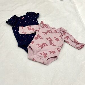 Two newborn girl onesies